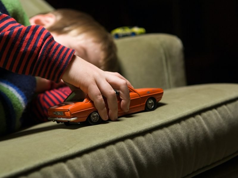 boy-playing-with-a-toy-car.jpg